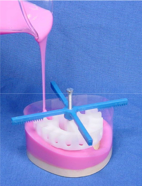 pouring-silicone-duplicating-technique dental model duplication